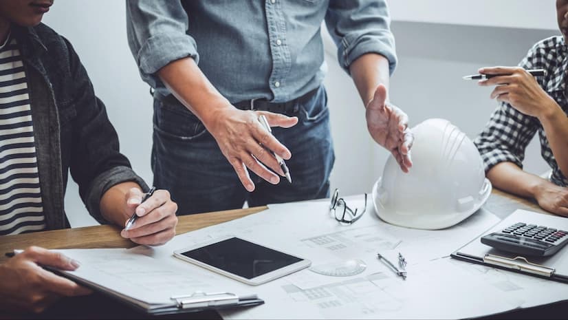 G3 Consulting team reviewing construction plans
